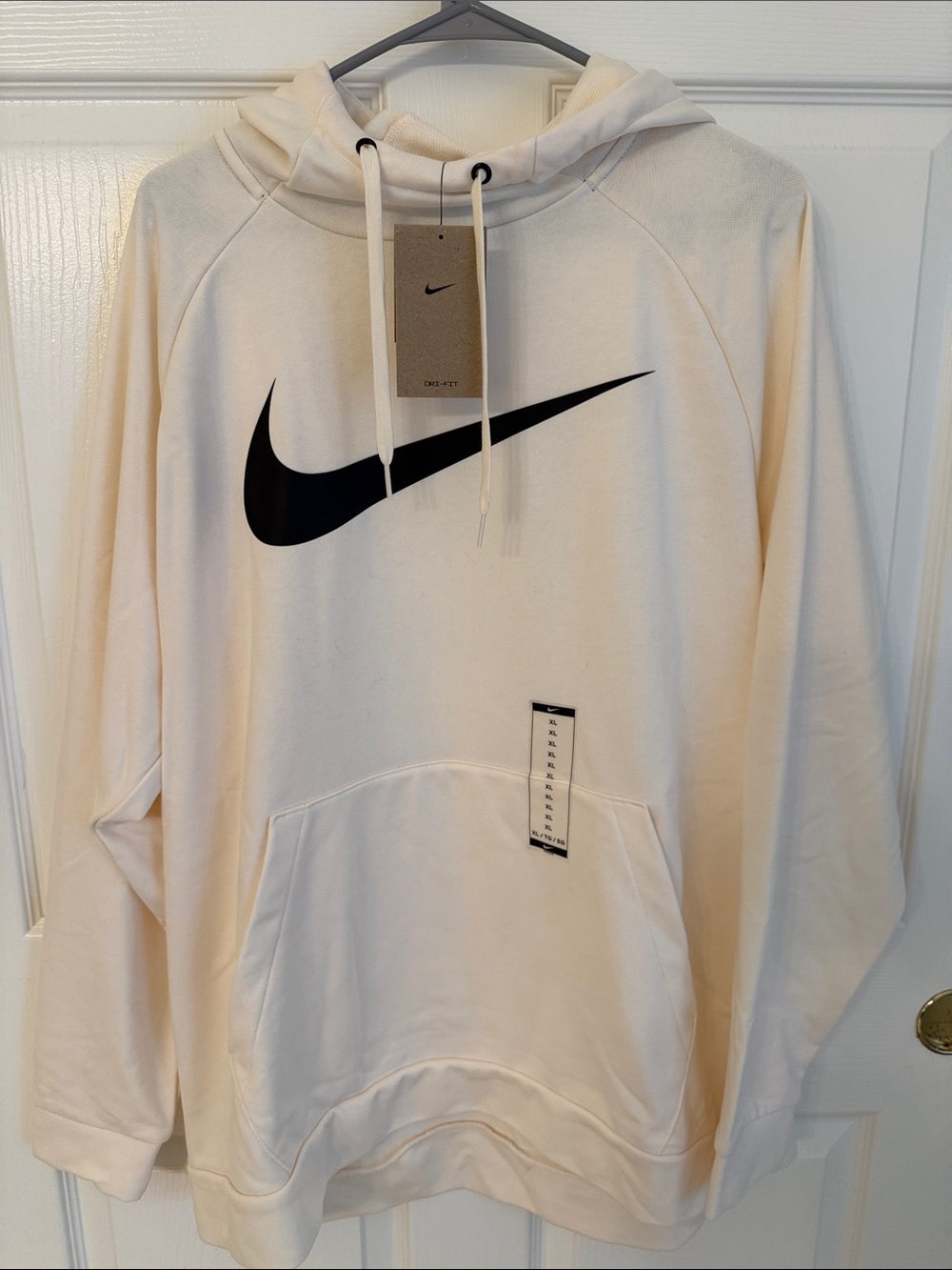 Nike Men's Cream Hoodie with Black Swoosh